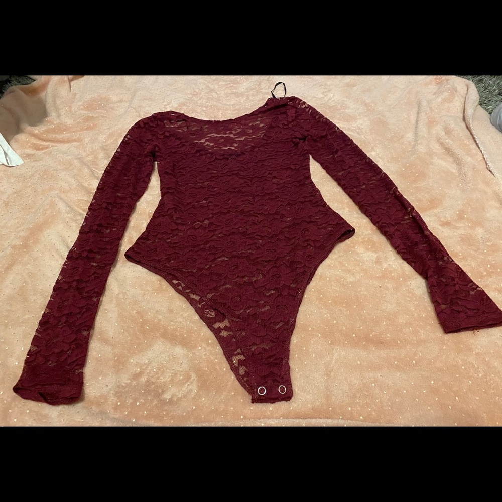 Laced body suit